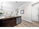 This kitchen boasts modern appliances, beautiful flooring, and is open to the other living spaces at 9121 Laureate Blvd, Orlando, FL 32827