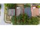 Aerial view showcasing the roof and backyard of the home at 10934 Rushwood Way, Clermont, FL 34714