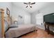 Bedroom featuring a bed, ceiling fan, and closet at 10934 Rushwood Way, Clermont, FL 34714