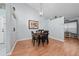 Formal dining room featuring modern chandelier and neutral paint at 10934 Rushwood Way, Clermont, FL 34714