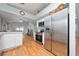 Bright open kitchen boasts stainless steel appliances and plenty of counter space at 10934 Rushwood Way, Clermont, FL 34714