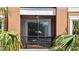 Relaxing screened in balcony with seating area, perfect for enjoying the outdoors at 1351 Venezia Ct # 201, Davenport, FL 33896
