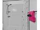 Close up of updated shower with white subway tile and a pink towel at 1351 Venezia Ct # 201, Davenport, FL 33896