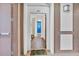Entryway showing the hallway and living area beyond the front door at 1351 Venezia Ct # 201, Davenport, FL 33896