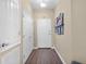 Entryway with closet, white front door, and view of the living space at 1351 Venezia Ct # 201, Davenport, FL 33896
