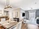 Open floor plan showcasing seamless flow between the dining and living areas at 1361 Tuscan Ter # 7303, Davenport, FL 33896