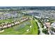This is an aerial view of the residential area, showcasing the scenic golf course at 1452 Mickelson Ct, Davenport, FL 33896