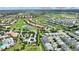 Scenic aerial view of a community and its proximity to Magic Kingdom, Animal Kingdom, and Epcot at 1452 Mickelson Ct, Davenport, FL 33896