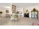 This dining area has a breakfast nook with decorative furniture and appliances at 1452 Mickelson Ct, Davenport, FL 33896