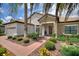 Charming single-Gathering home featuring beautiful stone accents, a two-car garage, and well-maintained landscaping at 1452 Mickelson Ct, Davenport, FL 33896