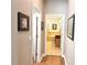 Hallway view of the bathroom with a soaking tub and tile flooring at 15230 Evergreen Oak Loop, Winter Garden, FL 34787