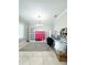 Versatile home office space with ample storage, neutral decor, and natural light at 15230 Evergreen Oak Loop, Winter Garden, FL 34787