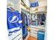 Organized walk-in closet featuring custom shelving and ample hanging space for clothes, shoes, and accessories at 15230 Evergreen Oak Loop, Winter Garden, FL 34787