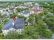An aerial view of the community, surrounded by mature trees and residential homes at 193 Longview Ave # 203, Celebration, FL 34747