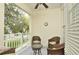 Relaxing balcony with comfortable seating and a scenic view, perfect for enjoying fresh air and quiet moments at 193 Longview Ave # 203, Celebration, FL 34747