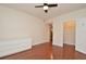 Spacious bedroom featuring wood floors, white walls, and an open closet at 193 Longview Ave # 203, Celebration, FL 34747