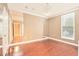 Spacious bedroom with a large mirror and plenty of natural light at 193 Longview Ave # 203, Celebration, FL 34747