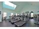 Community gym with high ceilings and a variety of modern exercise equipment at 193 Longview Ave # 203, Celebration, FL 34747