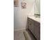 Bathroom with double vanity and modern fixtures at 1940 Egret Meadows Ave, Kissimmee, FL 34744