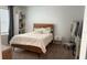 Bedroom with hardwood floors and a bed at 1940 Egret Meadows Ave, Kissimmee, FL 34744