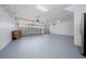 Spacious two car garage with automatic door openers and epoxy floors at 1950 Windward Oaks Ct, Kissimmee, FL 34746