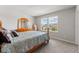 Bedroom with carpet floor, natural light, neutral walls and wood furniture at 2223 Bluebird Pl, St Cloud, FL 34771