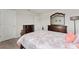 Bedroom with carpet floor, natural light, neutral walls and wood furniture at 2223 Bluebird Pl, St Cloud, FL 34771