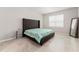 Cozy bedroom with neutral decor and a large bed at 2223 Bluebird Pl, St Cloud, FL 34771