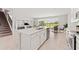 Stylish kitchen with stainless steel appliances and a large island with bar seating at 2223 Bluebird Pl, St Cloud, FL 34771