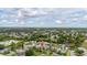 Real estate location pin on the home within a charming neighborhood with lush green trees at 2569 Tandori Cir, Orlando, FL 32837