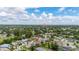 Real estate location pin on the home within a charming neighborhood with lush green trees at 2569 Tandori Cir, Orlando, FL 32837