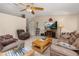 Comfortable living room with tile floors and a ceiling fan at 2569 Tandori Cir, Orlando, FL 32837