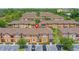 Aerial view of the community with well-kept grounds and convenient parking, near the clubhouse at 2708 Camaro Dr, Kissimmee, FL 34746