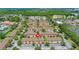 Aerial view of the residential community showcasing pools, landscaping, and proximity to neighborhood amenities at 2708 Camaro Dr, Kissimmee, FL 34746