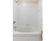 Bathroom features a shower-tub combo with a white tiled wall at 2708 Camaro Dr, Kissimmee, FL 34746