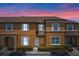 Inviting two-story townhome featuring a well-maintained exterior and a charming entryway at 2708 Camaro Dr, Kissimmee, FL 34746