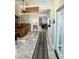 Hallway area with patterned floor tile and plenty of natural light throughout the home at 3407 Santa Monica Dr, Orlando, FL 32822