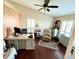 Bright office space with vaulted ceiling, ceiling fan, plantation shutters and plenty of natural light at 3407 Santa Monica Dr, Orlando, FL 32822