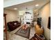 This living room has a ceiling fan, recessed lighting, a leather sofa, and a fireplace at 3407 Santa Monica Dr, Orlando, FL 32822