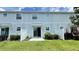 Townhome backyard featuring a patio and partial fence at 4634 Tribute Trl, Kissimmee, FL 34746