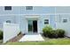 Townhome backyard featuring a patio and partial fence at 4634 Tribute Trl, Kissimmee, FL 34746