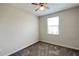 Bedroom featuring neutral walls, carpeted flooring, and a window for natural light, creating a relaxing space at 4634 Tribute Trl, Kissimmee, FL 34746