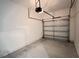 A clean, one-car garage with a functional garage door at 4634 Tribute Trl, Kissimmee, FL 34746