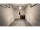 A clean and functional single-car garage with painted walls at 4634 Tribute Trl, Kissimmee, FL 34746