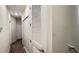 Hallway view of doors, closets and carpeted floor at 4634 Tribute Trl, Kissimmee, FL 34746