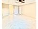 Bedroom with new tile floor, ceiling fan, closet and neutral paint at 4917 Easton St, Lake Wales, FL 33859