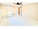 Bedroom with new tile floor, ceiling fan, closet and neutral paint at 4917 Easton St, Lake Wales, FL 33859
