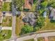 An overhead shot reveals a well-maintained property with verdant landscaping and tree coverage at 511 Mobley Dr, Deltona, FL 32725