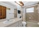 Bathroom featuring vanity with storage and a shower-tub combo with neutral colored tiles at 511 Mobley Dr, Deltona, FL 32725