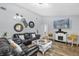 Cozy living room with a decorative fireplace, hardwood flooring, and modern decor at 511 Mobley Dr, Deltona, FL 32725